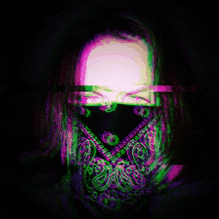 Picture of Alec Davis, looking mysterious with a bandana covering his face.